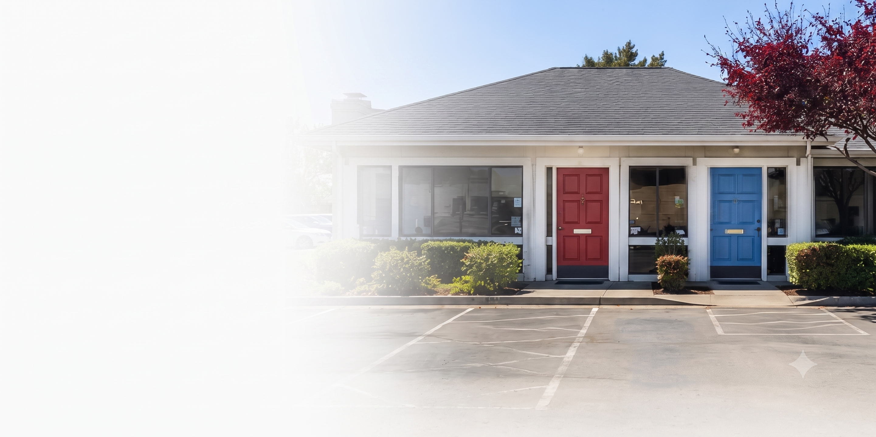 The expanded Milpitas office with maroon and blue entrance doors