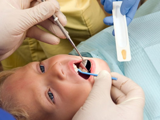 dentist doing oral cleaning to a patient in milpitas dentist doing oral cleaning to a patient in milpitas